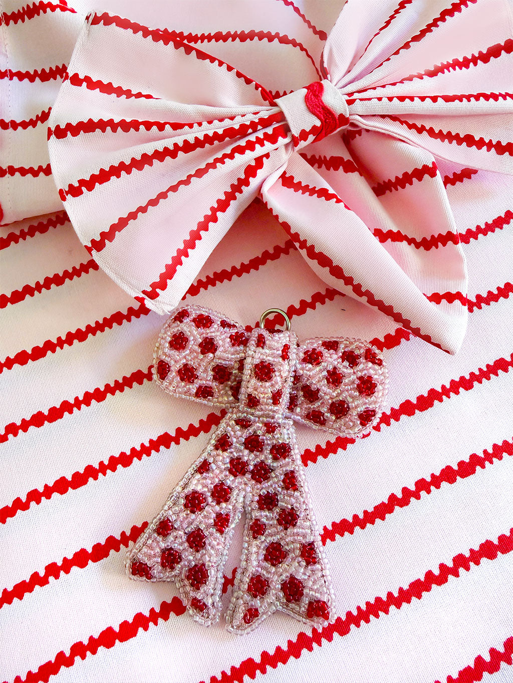Bow Ornament with Pearls Red Dots on Pale Pink