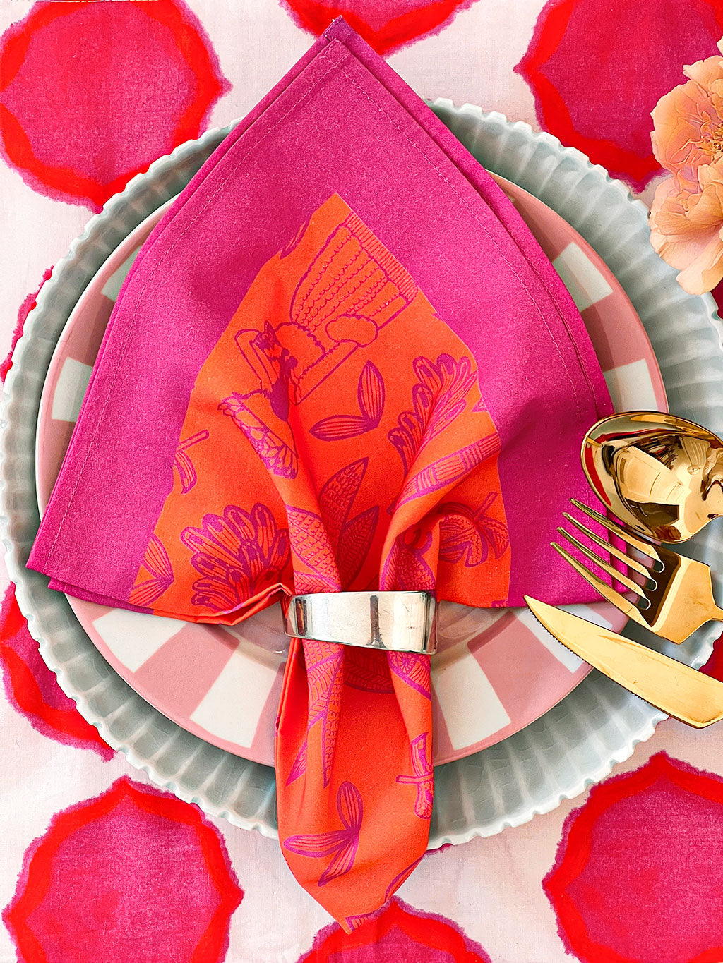 Elegant linen napkin with vibrant botanical pattern and contrast edging