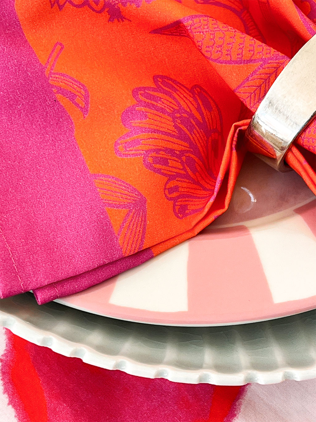 Close-up of high-quality linen texture with artisanal tropical print