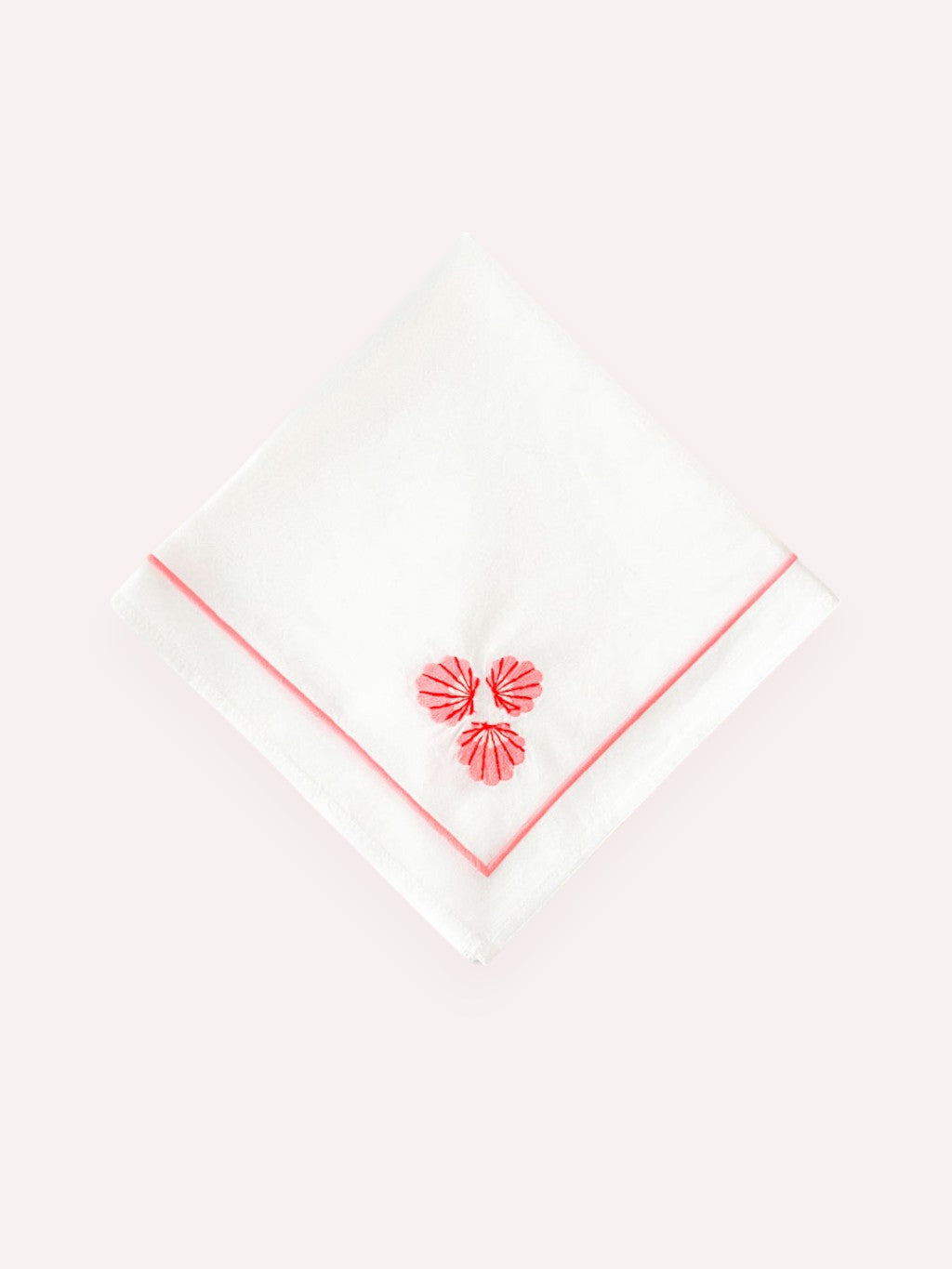 White linen napkin with red shell embroidery by Nimo With Love

