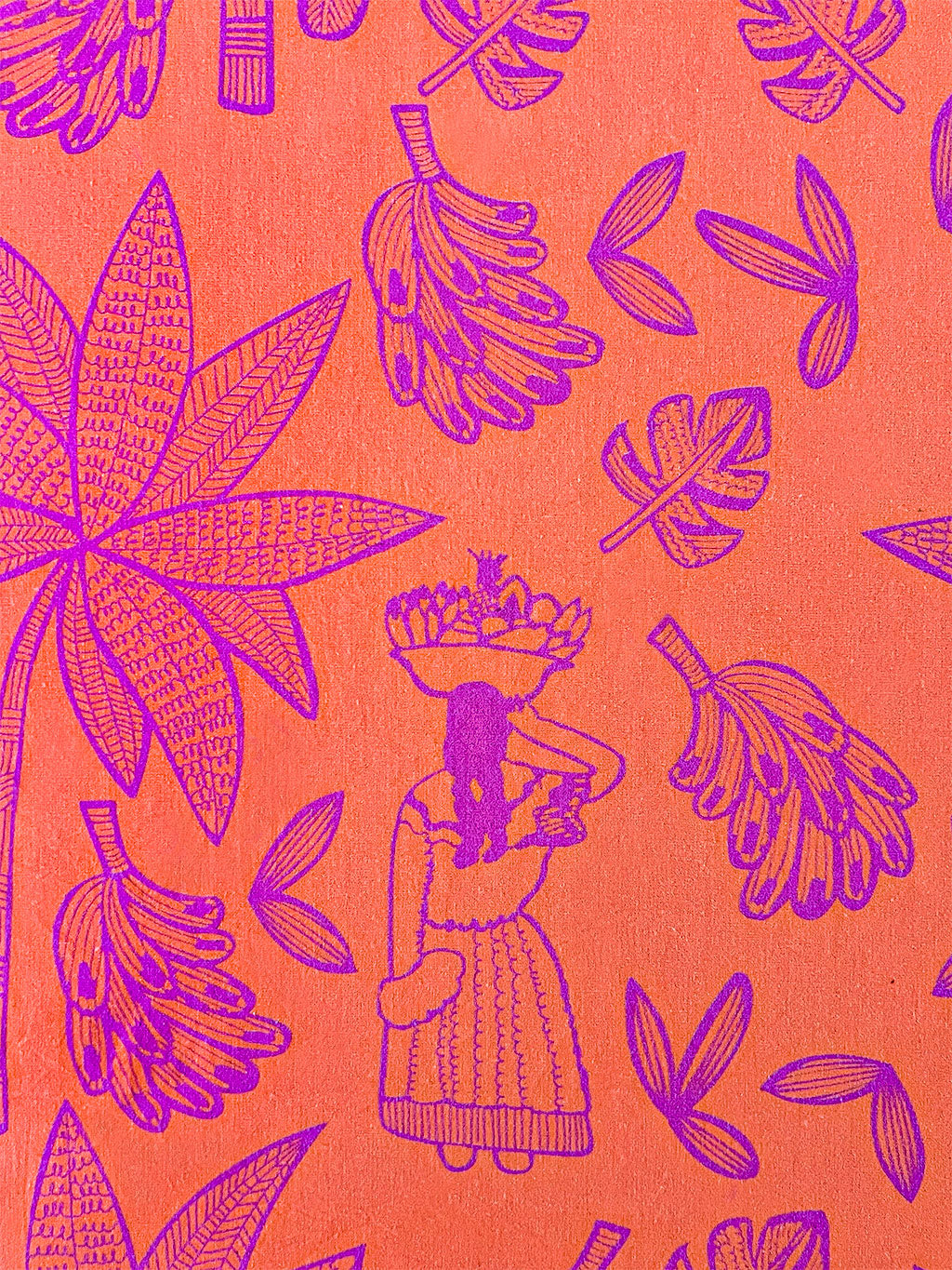 Detailed view of hand-printed tropical leaf motif on premium linen
