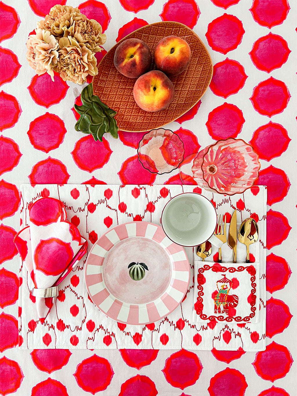 Elegant dining table set with signature ikat linen tablecloth by Nimo With Love