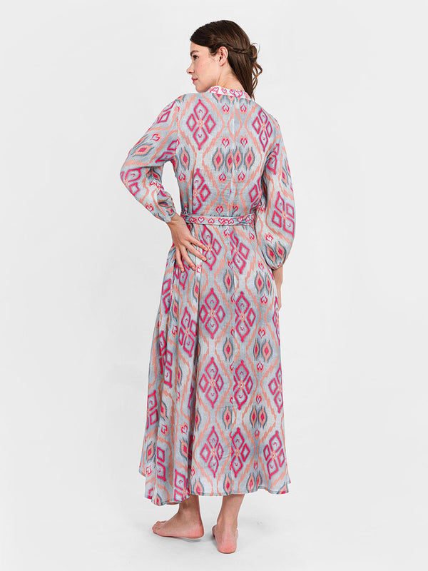 Rear view of the Marigold linen dress showcasing the effortless drape and the diamond ikat pattern.