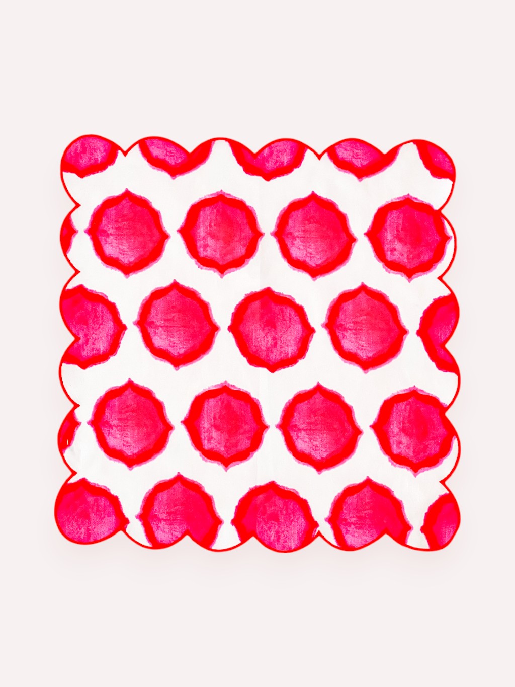 hand-printed linen napkin with signature ikat design in pink and orange