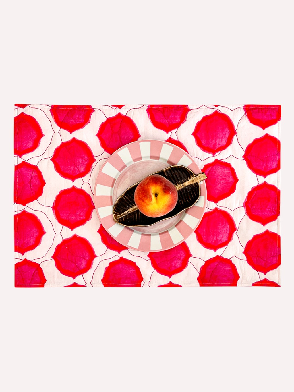 ikat pink orange quilted linen placemat with light padding