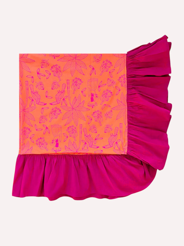 Close-up of the artisanal ruffle hem on premium linen fabric