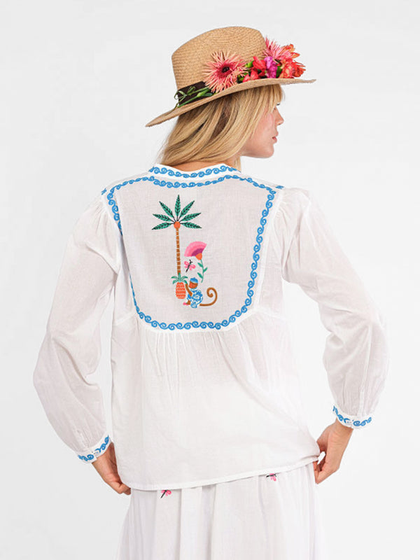 Back view of the Catnep blouse showing a large central palm and monkey motif