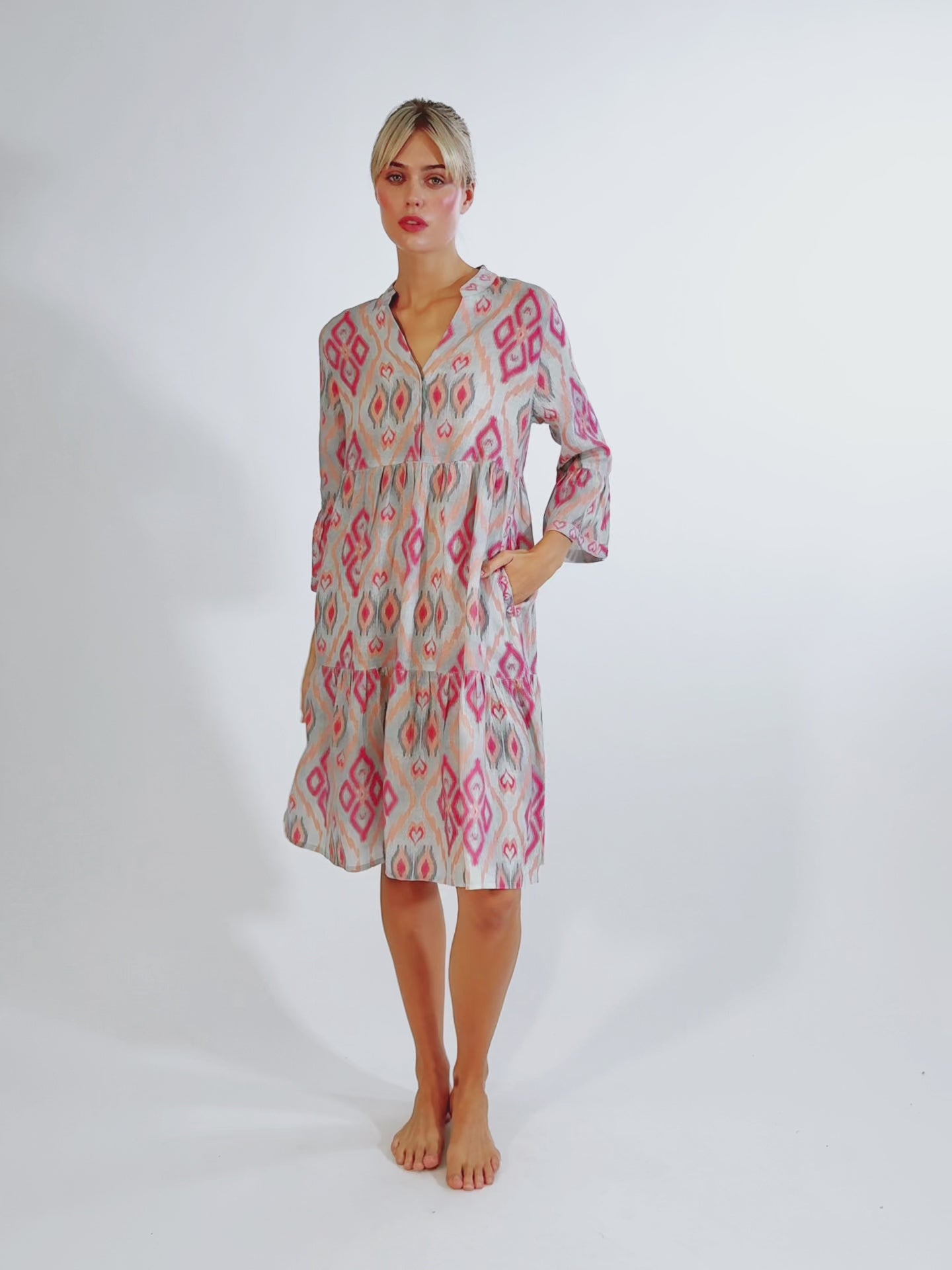 Video of a model showcasing the effortless movement and inclusive, flattering fit of the Borage linen dress, styled with and without the matching scarf belt.