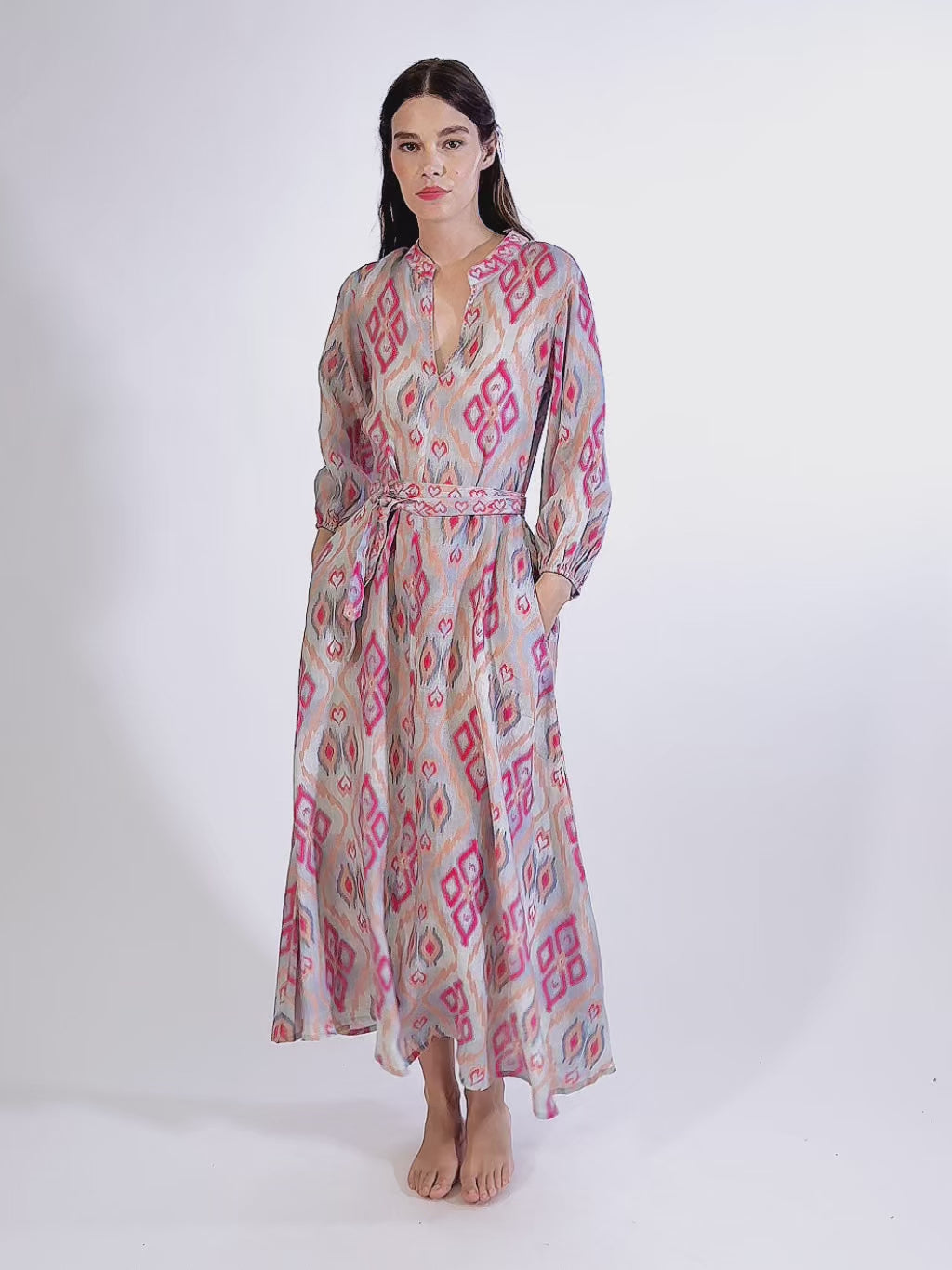 Video of a model showcasing the comfortable, modest fit of the Marigold linen dress